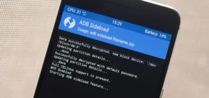 Android phone in TWRP ADB Sideload mode showing successful decryption and partition update terminal output.